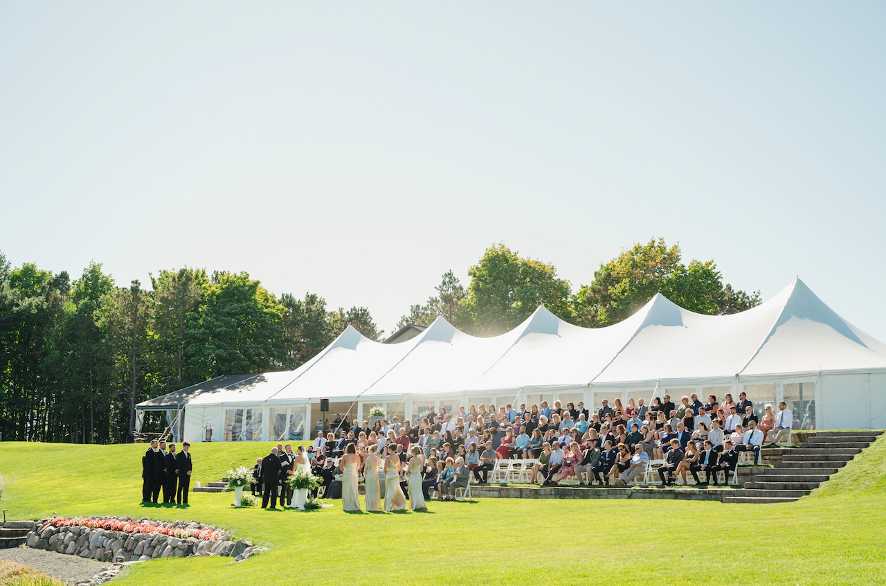 Guests enjoying a wedding ceremony outdoors at Verterra Winery.